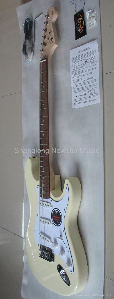 fender stratocaster wallpaper. White fender stratocaster with gold pickguard