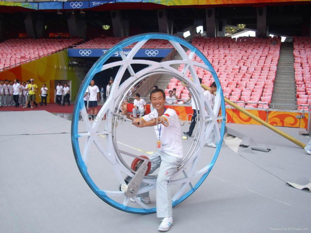 http://img.diytrade.com/cdimg/427463/6750266/0/1219846535/Mono_wheel_bikes_Light_Wheels_monocycle_unicycle_vehicle_fitness_bike.jpg