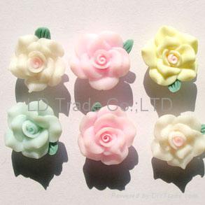http://img.diytrade.com/cdimg/455477/2597138/0/1205306593/FIMO_Flowers_FIMO_beads_Mobile_decoration.jpg