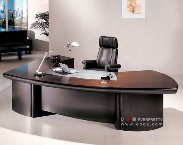 boss behind desk