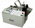 Plastic tube cutting machine