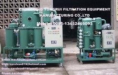 Two stage vacuum transformer oil regeneration and decolorization system