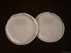 Disposable breast pad. Disposable nursing pad