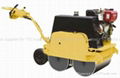 Walk-behind vibratory road roller