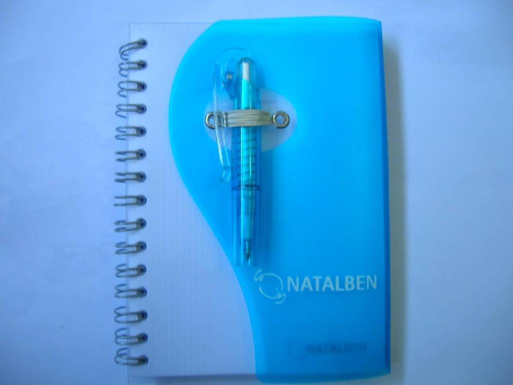 spiral notebook with pen 2