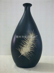 Black ceramic Chinese vase with feather