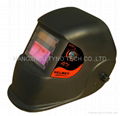 Solar auto-darkening helmet