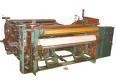 Screen mesh weaving machine