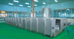 Continuous spray cooling machine 