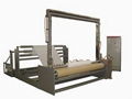 Nonwoven slitting and rolling machine