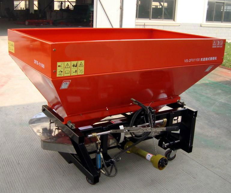 Twin disc spreader