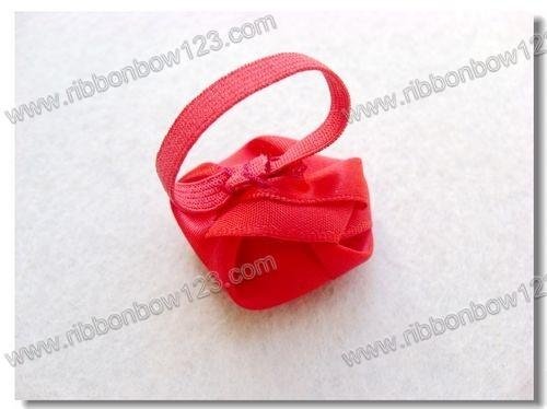 red bow with gold border and flower middle for red wine packaging 4