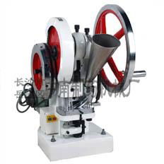 Single punch tablet press 