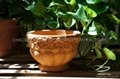 Red terracotta pot with snail design 4