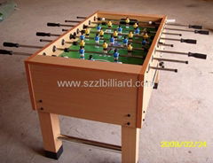 Indoor coin-operated soccer table