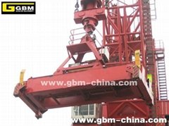 Hydraulic rotating container spreaders