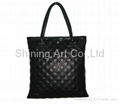 Black lattice veins embossed leather handbag 1