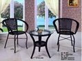 Rattan and wrought iron table and chair