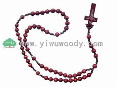 women's rosary beads made of red carved wooden beads