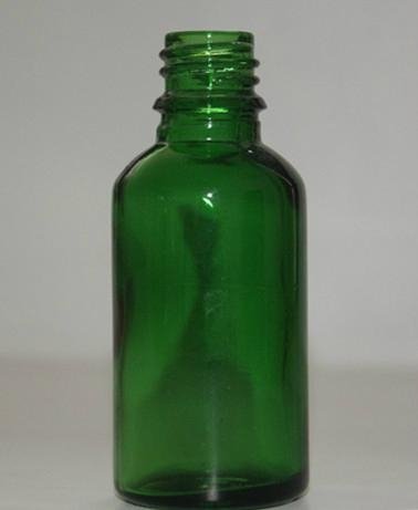 Green essential oil bottle