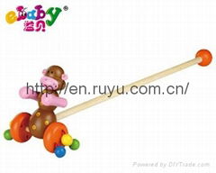 wooden push along toy with monkey