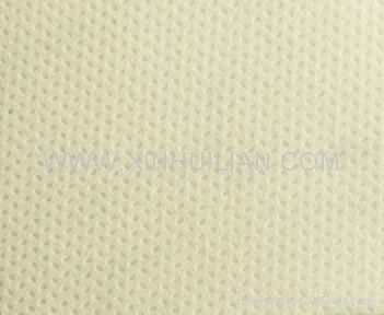 Nonwoven fabric with sesame design 