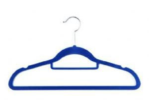 Suit hanger with tie bar and indent