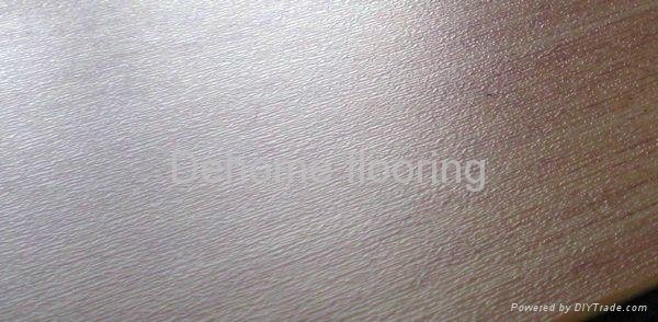 Pocked surface laminate flooring 