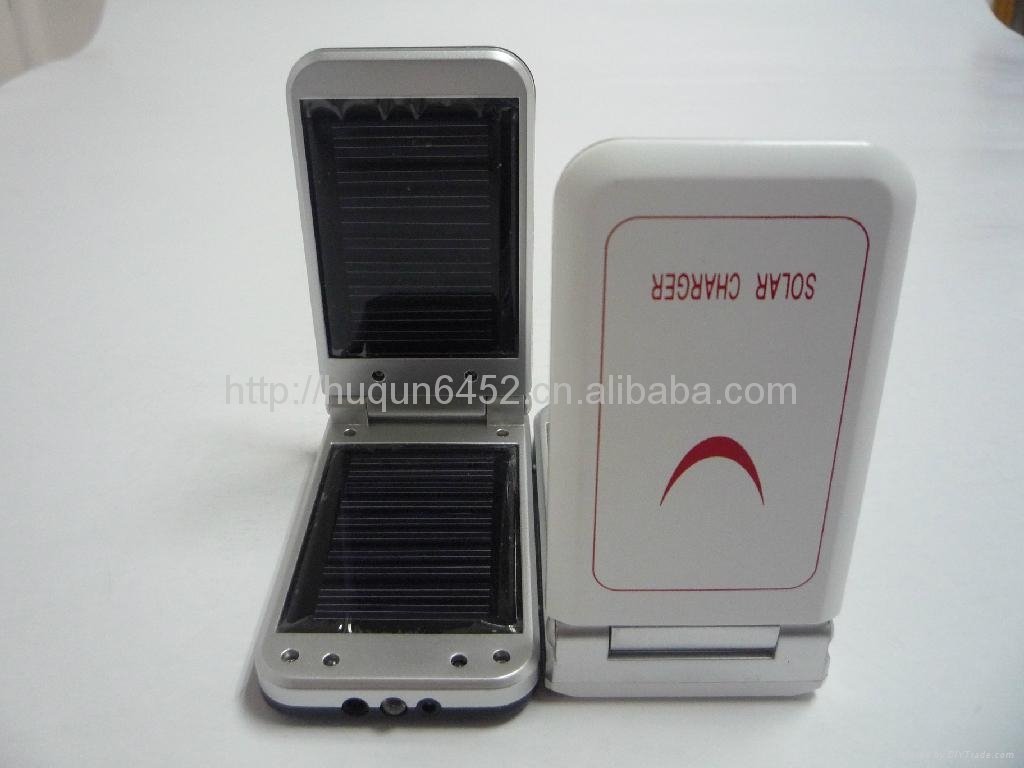 Double plate of solar energy cell phone labeled the charger