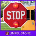 Auto Turning Stop Sign fixed on School Bus