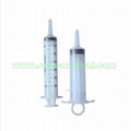 Irrigation syringe