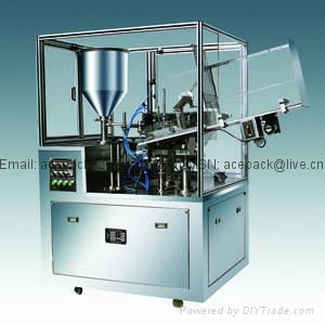 Metal tube filling and sealing machine