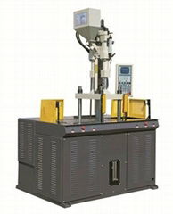 Double shuttle table injection machine