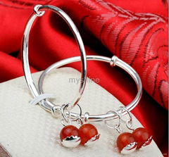 Personalised silver baby bracelet with red crystal bells