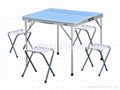 blue plastic camping table with 4 stools 4