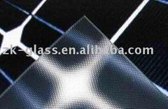 Ultra white patterned solar glass