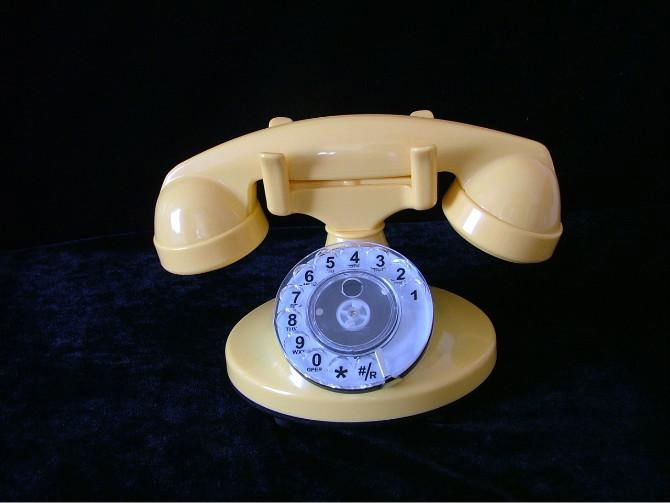 ancient plastic home telephone with wire 4