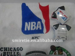 T-shirt shaped NBA branded compressed towel