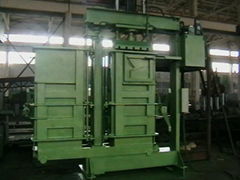 Two chamber rotation textile baler