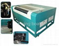 Engraving and cutting machine for