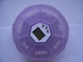 one week pill box with timer