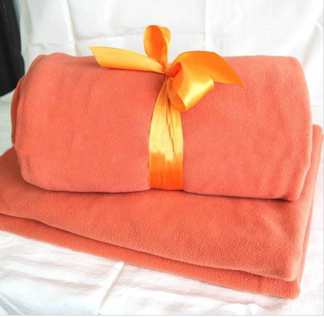 Solid colour coral plush throw/blanket