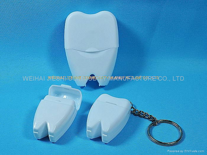 Tooth shaped dental floss with keychain