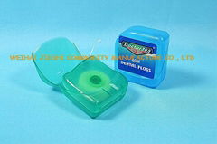 Tooth shaped dental floss with keychain