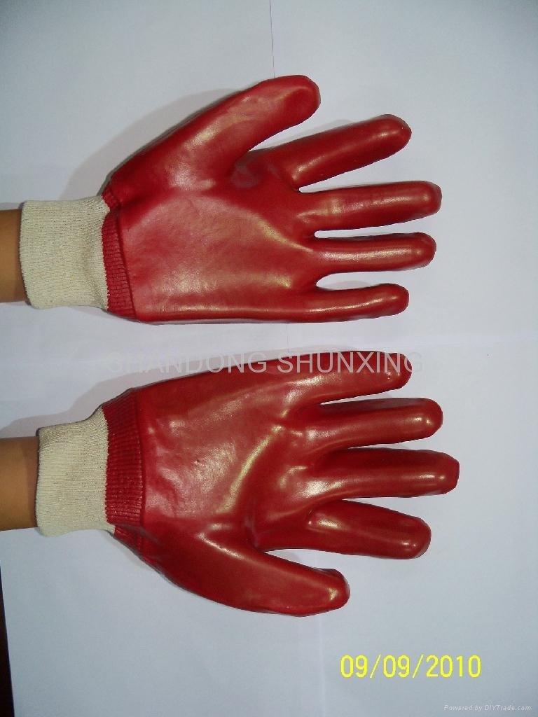 Red pvc gloves interlock liner/jersey liner