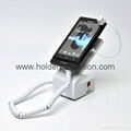 mobile phone display stand with alarm 1