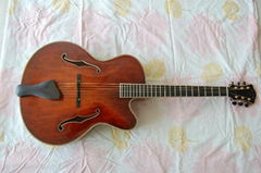 Wholesale fully handmade jazz electric guitar with solid wood.