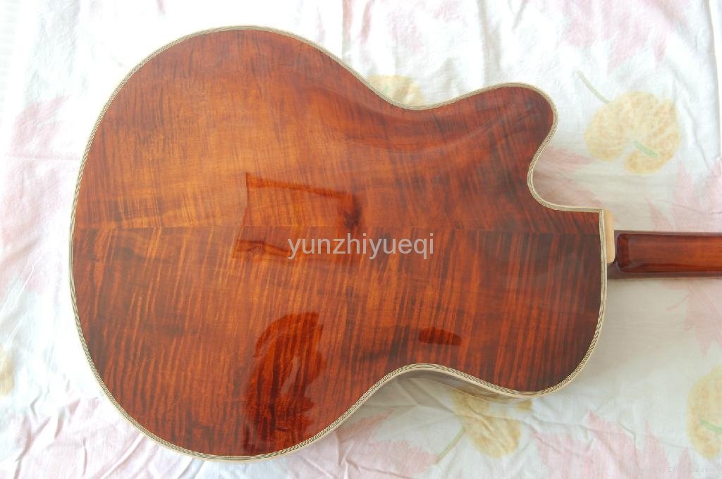 Wholesale fully handmade jazz electric guitar with solid wood. 3