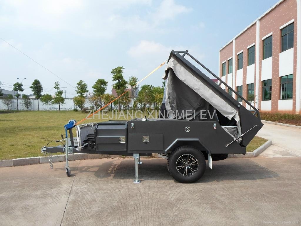  Off road backward folding hard floor camping trailer with carry rack upon  3