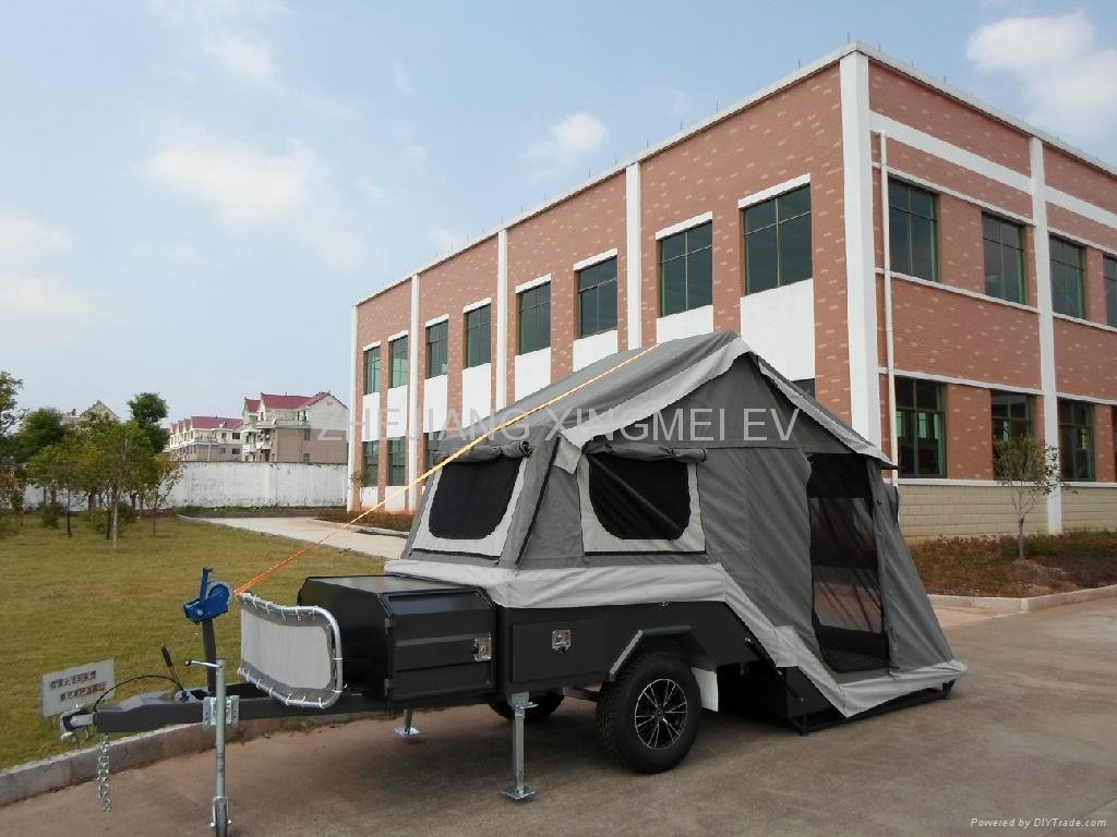  Off road backward folding hard floor camping trailer with carry rack upon  4